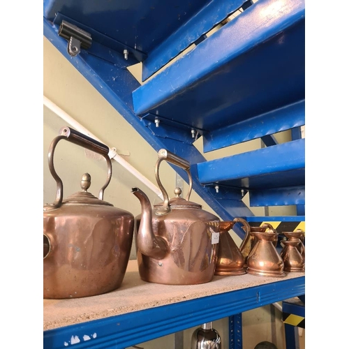 17 - Two old Copper kettles and 5 graduated measures