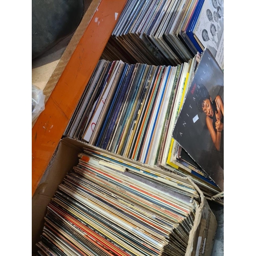 256 - Three boxes of vinyl LP records, mixed genres