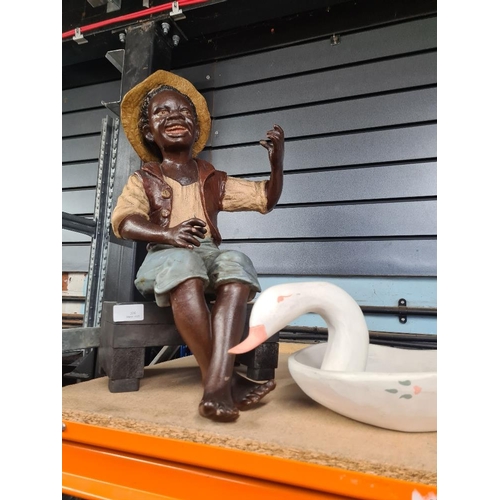 326 - Bretby Terracotta and painted figure of seated boy with hat and two other items