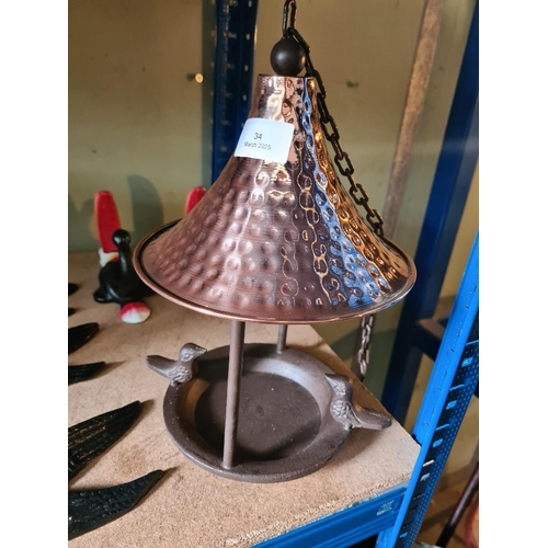 34 - Copper roofed bird feeder