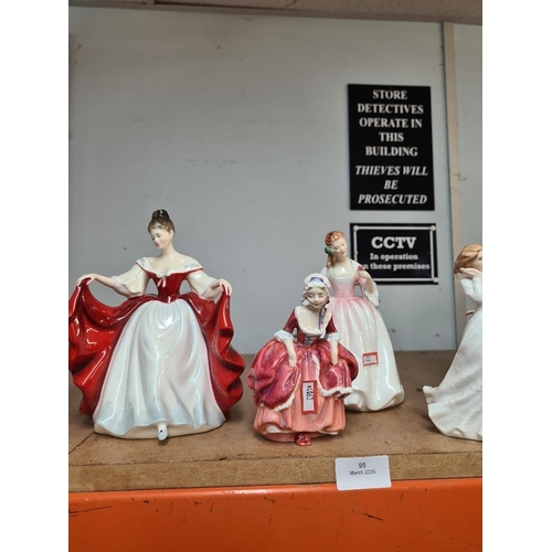 95 - 9 Royal Doulton figures of ladies