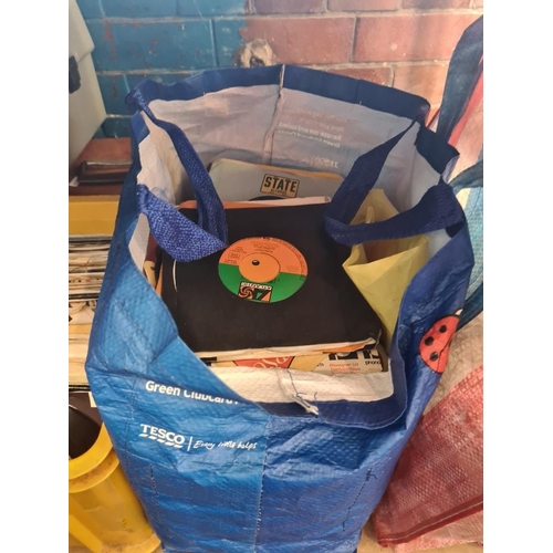 12 - Large quantity of vinyl 7 inch singles, some in cases