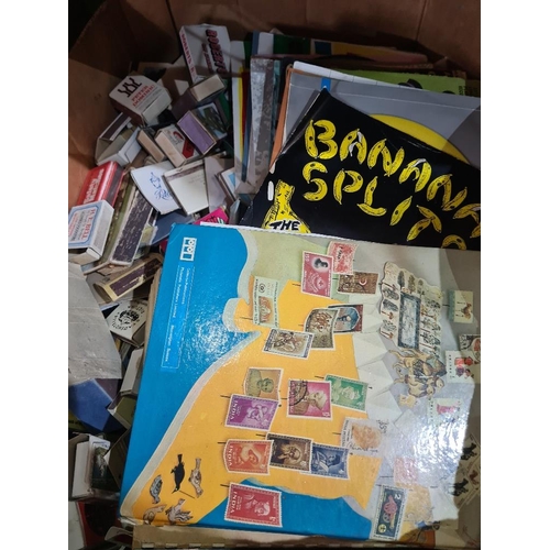 168 - Quantity of vintage matchboxes, small quantity of vinyl singles and 2 mediocre stamp albums