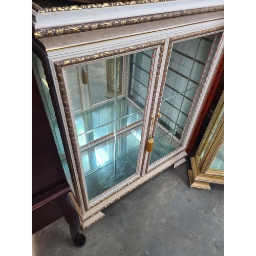 84 - Modern cream and gilt display cabinet with mirror panels