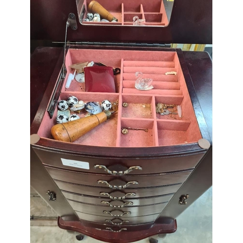 86 - Reproduction jewellery chest with central doors and cupboards