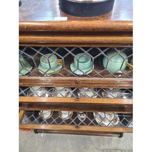 90 - Globe Wernicke Oak Three section bookcase with leaded glass doors