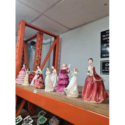 95 - 9 Royal Doulton figures of ladies