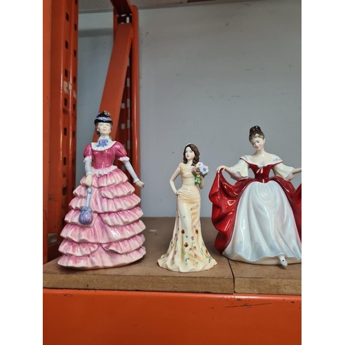 95 - 9 Royal Doulton figures of ladies