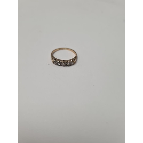 1027 - 18ct yellow gold band ring set 5 graduating diamonds, size O, marked 18ct, approx 2.36g