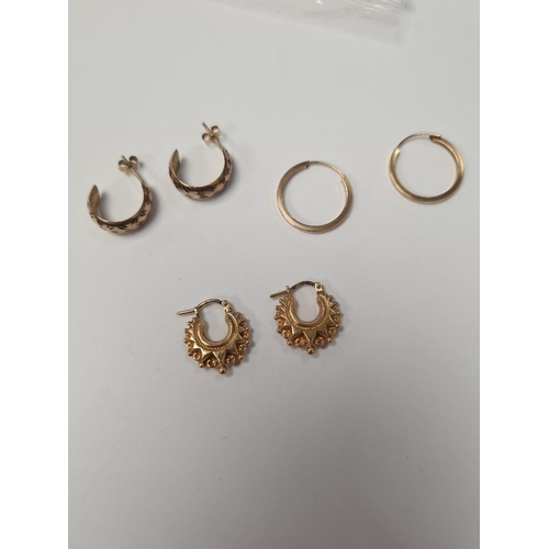 1063 - Pair of 9ct yellow gold Creole earrings, marked 375, and two other pairs hoop earrings, approx 3.4g