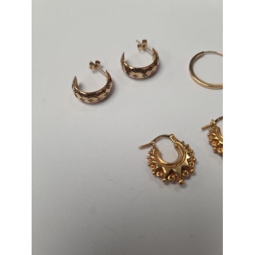 1063 - Pair of 9ct yellow gold Creole earrings, marked 375, and two other pairs hoop earrings, approx 3.4g