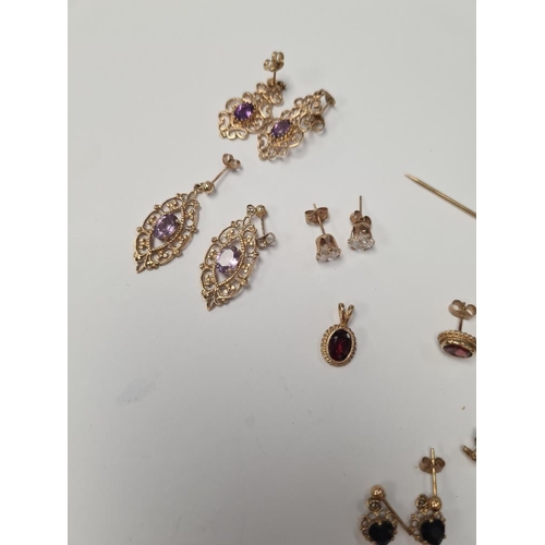 1071 - Quantity of 9ct yellow gem set earrings and pendants, to include a Victorian stick pin with crescent... 