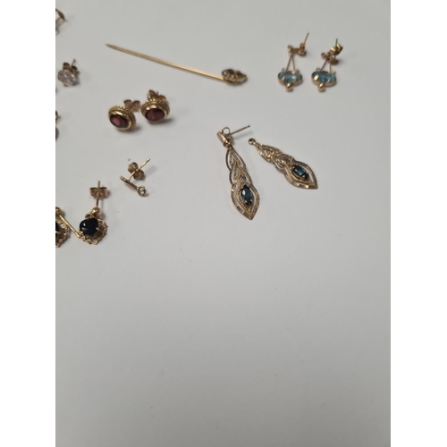 1071 - Quantity of 9ct yellow gem set earrings and pendants, to include a Victorian stick pin with crescent... 