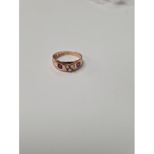 1002 - Antique 9ct rose gold ruby and seed pearl ring, with 3 central seed pearls, and two round cut rubies... 