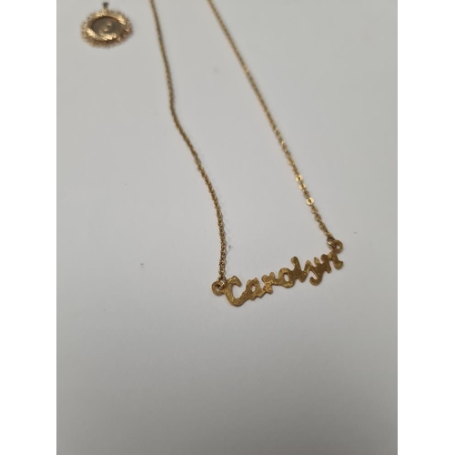 1004 - Fine 9ct yellow gold neckchain hung with a 9ct gold cross pendant and circular yellow metal pendant ... 