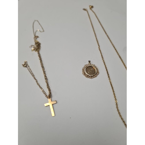 1004 - Fine 9ct yellow gold neckchain hung with a 9ct gold cross pendant and circular yellow metal pendant ... 