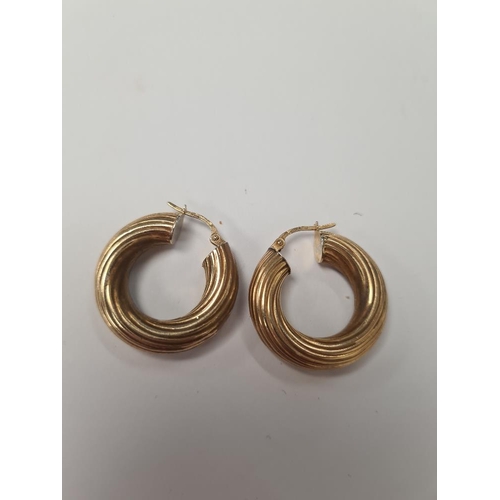 1011 - Pair of 9ct yellow gold hoop earrings, 2.5cm diameter, marked 375, approx 4g