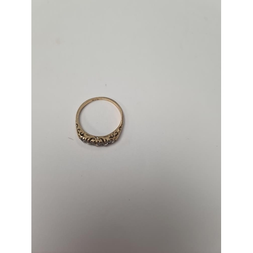 1027 - 18ct yellow gold band ring set 5 graduating diamonds, size O, marked 18ct, approx 2.36g