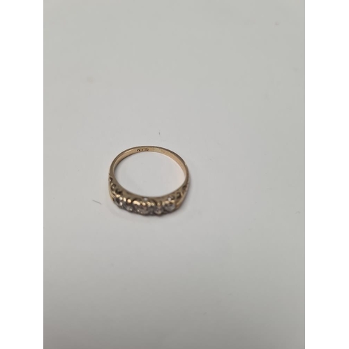 1027 - 18ct yellow gold band ring set 5 graduating diamonds, size O, marked 18ct, approx 2.36g