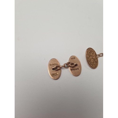 1030 - Two 9ct yellow gold cufflinks with all over floral decoration, marked .375, approx 9.5g