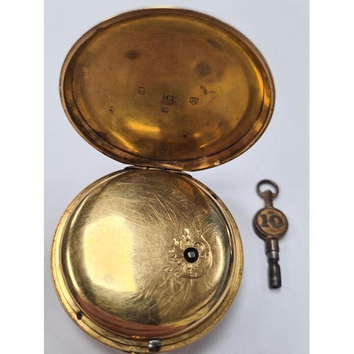 1046 - 18ct yellow gold pocket watch with decorative golden dial, Roman numerals, seconds dial and engraved... 