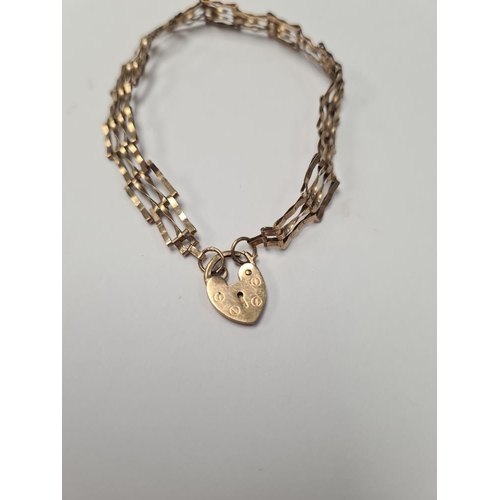 1053 - 9ct yellow gold 3 bar gatelink bracelet, marked 375, with heart shaped clasp, approx 3.1g