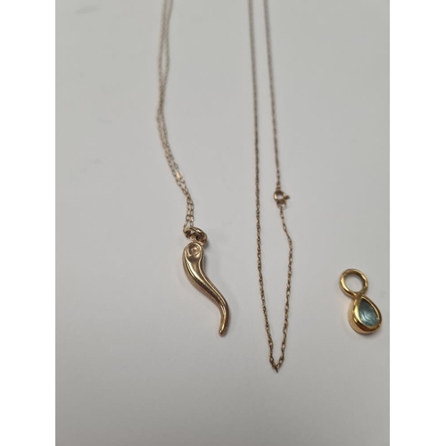 1059 - Fine 9ct yellow gold chains, one hung with a pendant, and another 9ct gold pendant set with blue top... 