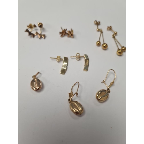 1065 - Six pairs of 9ct yellow gold earrings, and a 9ct gold pendant, 5.32g approx