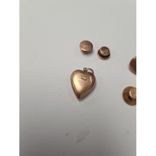 1067 - Selection of 9ct yellow gold dress studs, and a 9ct yellow gold heart shaped locket with enameled an... 