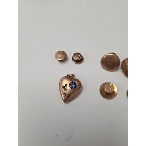 1067 - Selection of 9ct yellow gold dress studs, and a 9ct yellow gold heart shaped locket with enameled an... 