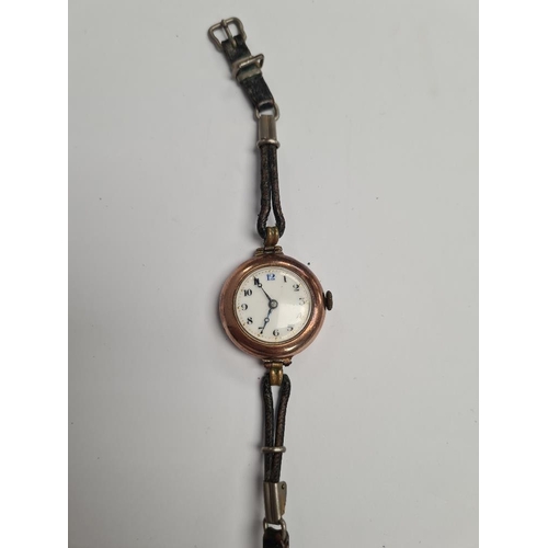 1108 - Antique yellow gold cased watch with white enamel dial, with numbers and dot markers, case does not ... 