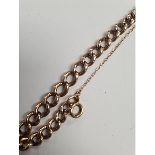 1121 - Unmarked yellow gold curb link bracelet, marks worn, with safety chain, approx 19.24g 