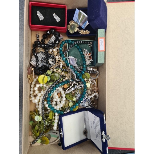 1203 - A tray of vintage and modern costume jewellery to include amber set jewellery