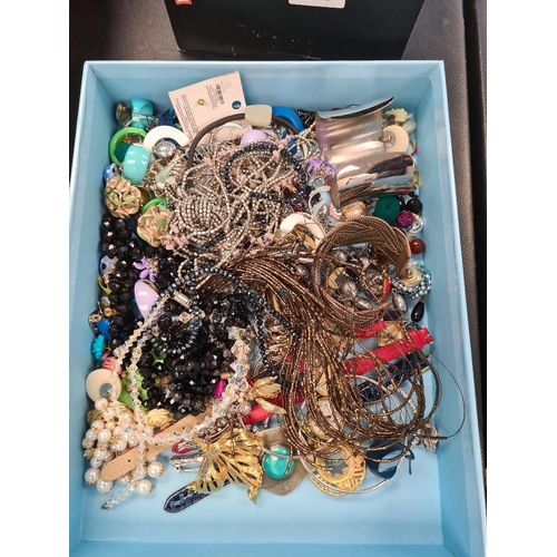 1204 - A tray of vintage and modern costume jewellery to include jet necklaces, various earrings, bracelets... 