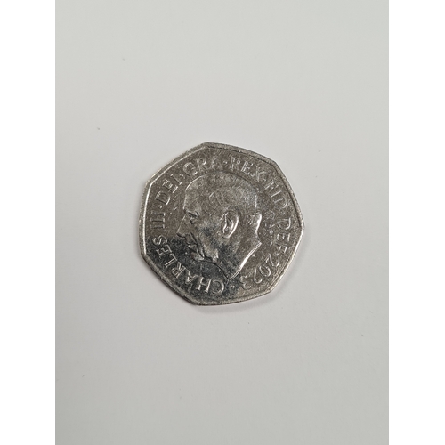 1286 - A 2023 '50p piece' depicting a salmon.