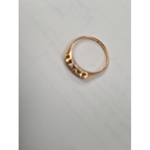 1011A - Pretty 18ct yellow gold ring with 5 graduating diamonds, size O, marked 18, 2.2g.