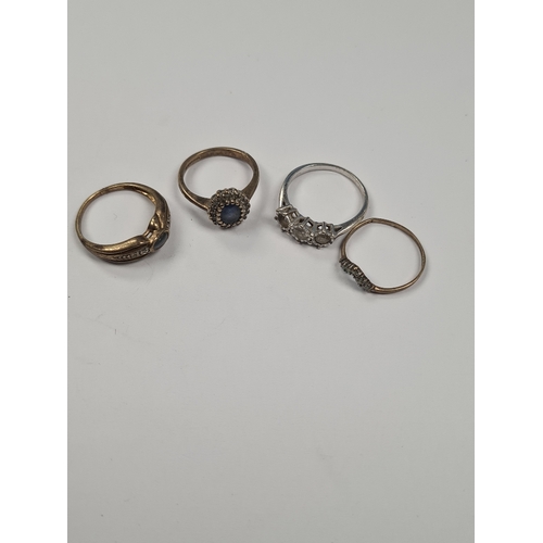 1013A - 4 9ct gold dress rings to include wishbone, cluster, trilogy AF, all marked 375, 8.45g.