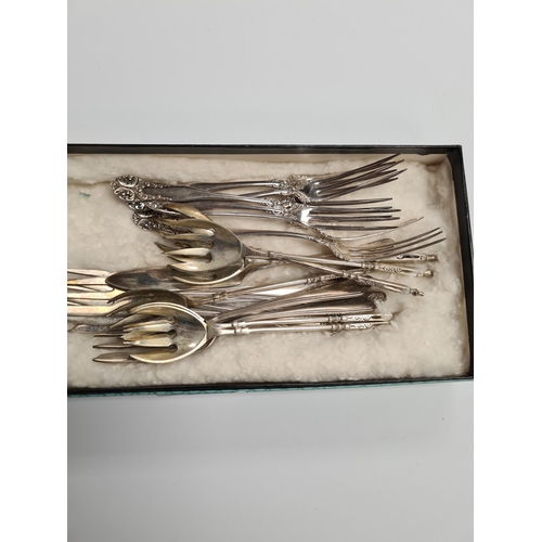 11 - Silver cake forks by William Suckling Ltd, also with continental silver forks. 6.07ozt approx. Condi... 