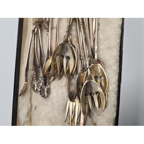 11 - Silver cake forks by William Suckling Ltd, also with continental silver forks. 6.07ozt approx. Condi... 