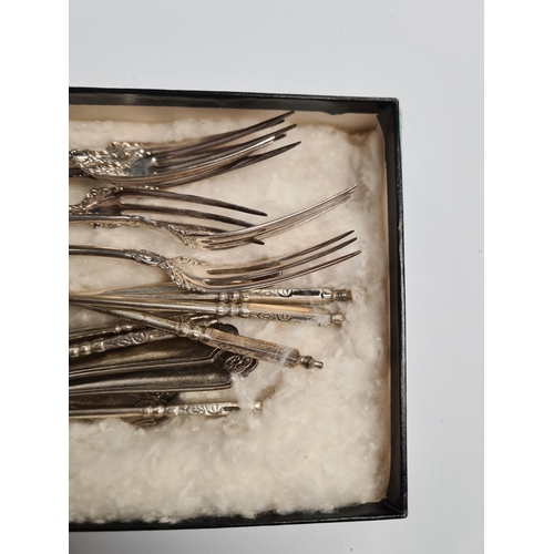 11 - Silver cake forks by William Suckling Ltd, also with continental silver forks. 6.07ozt approx. Condi... 
