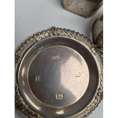 12 - A white metal decorative rectangular box, silver trinket dish, napkin rings, bangle, sauce boat by S... 