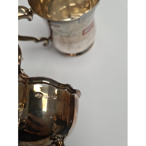 19 - A Viners Ltd., heavy silver tankard having Acanthus leaf handle and heavy base, stamped 6th August 1... 