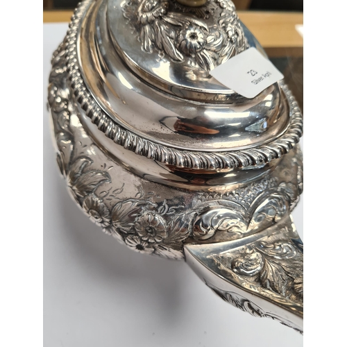 23 - A Georgian silver tea service items of attractive design, London 1823, maker HB possibly, teapot app... 