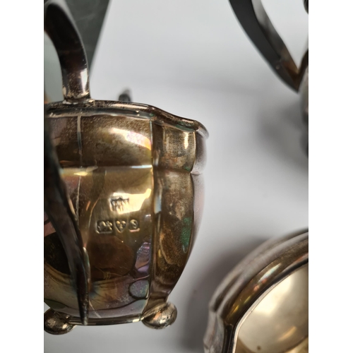 27 - A silver tea service hallmarked Chester 1929. S Blanckensee and Son Ltd. Comprising teapot, creamer ... 