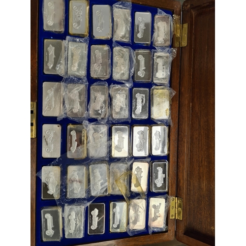 33 - The Lord Montagu Collection of Great Cars Ingots. A cased set of 36 silver ingots by John Pinches Lt... 