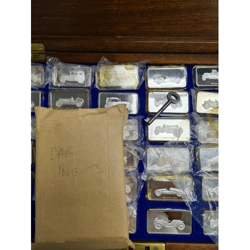 33 - The Lord Montagu Collection of Great Cars Ingots. A cased set of 36 silver ingots by John Pinches Lt... 