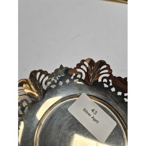 43 - A Sterling silver trinket dish having decorative, pierced border. Hallmarked Sheffield 1958, Viner's... 