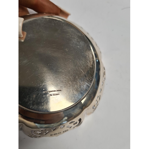 43 - A Sterling silver trinket dish having decorative, pierced border. Hallmarked Sheffield 1958, Viner's... 