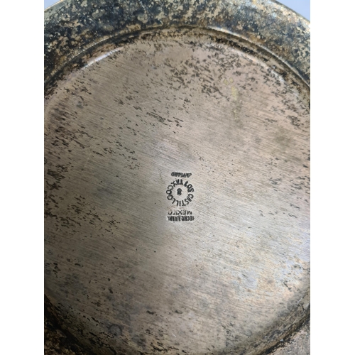 50 - A plated Mexican plate by Los Castillo, Taxco. Having pretty Mother of Pearl and Abaloney details. A... 