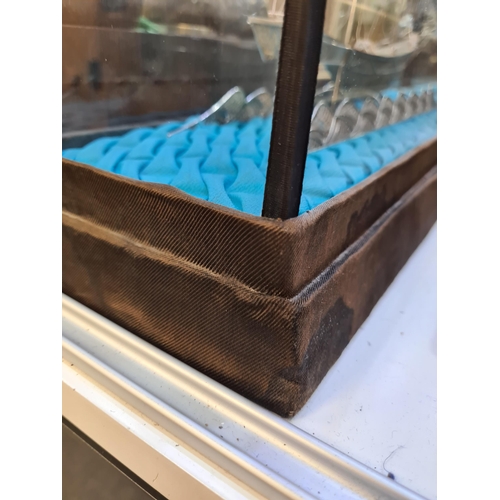 52 - A filigree large boat in a case, having very intricate details, and ornate figures on the Sails. Att... 